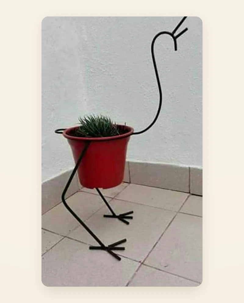 الفلامنغو · حامل نباتات على شكل طائر